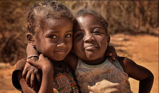 Two little girls hugging