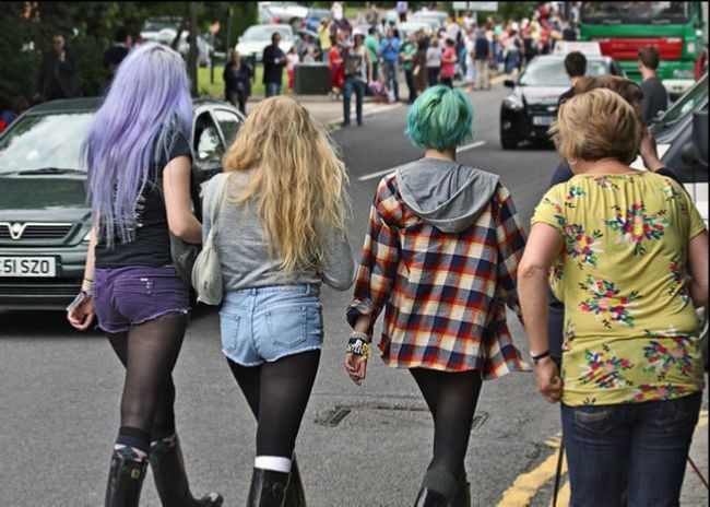 Young women wearing short-shorts with tights