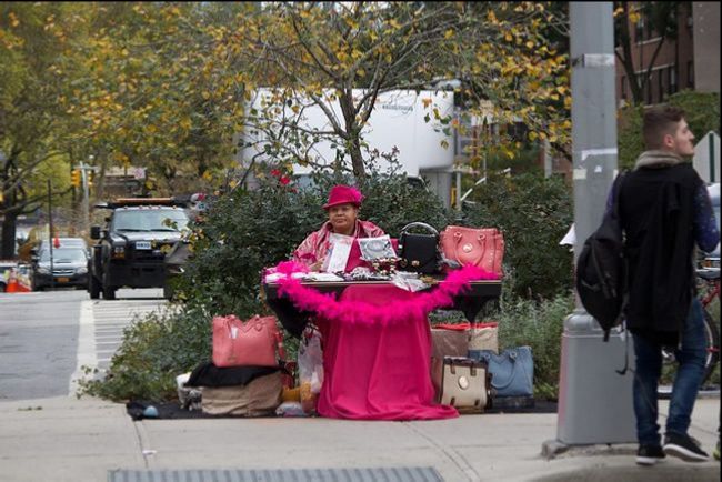 Street vendor selling fake brand name goods