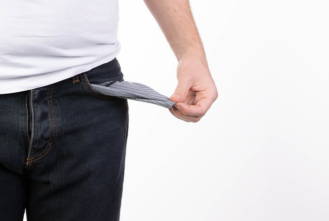 Man in jeans with empty pocket