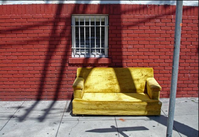 Sofa left on sidewalk